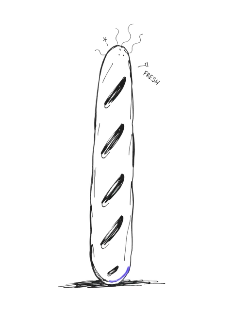 A tall fresh baguette with steam